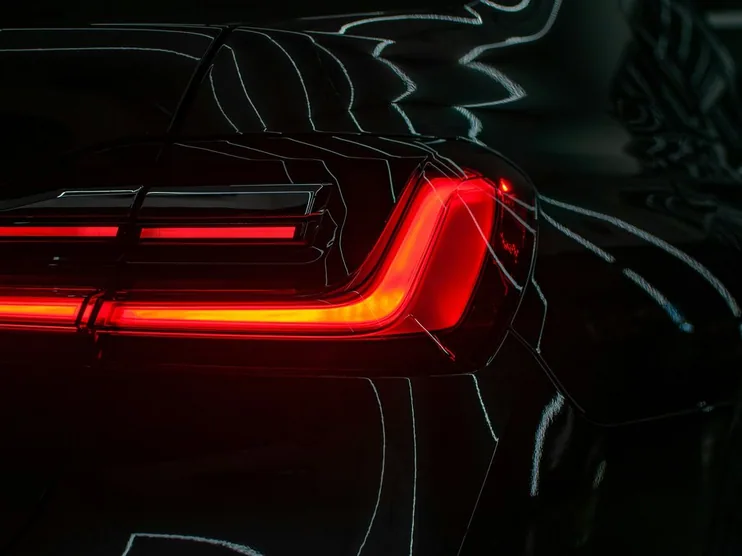 tail light and glossy rear, close