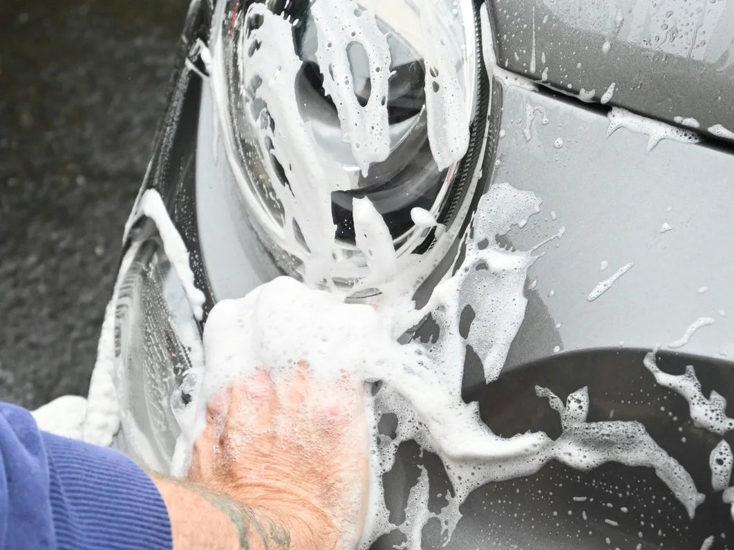 paint decontamination before coating — clay or iron fallout remover on a panel