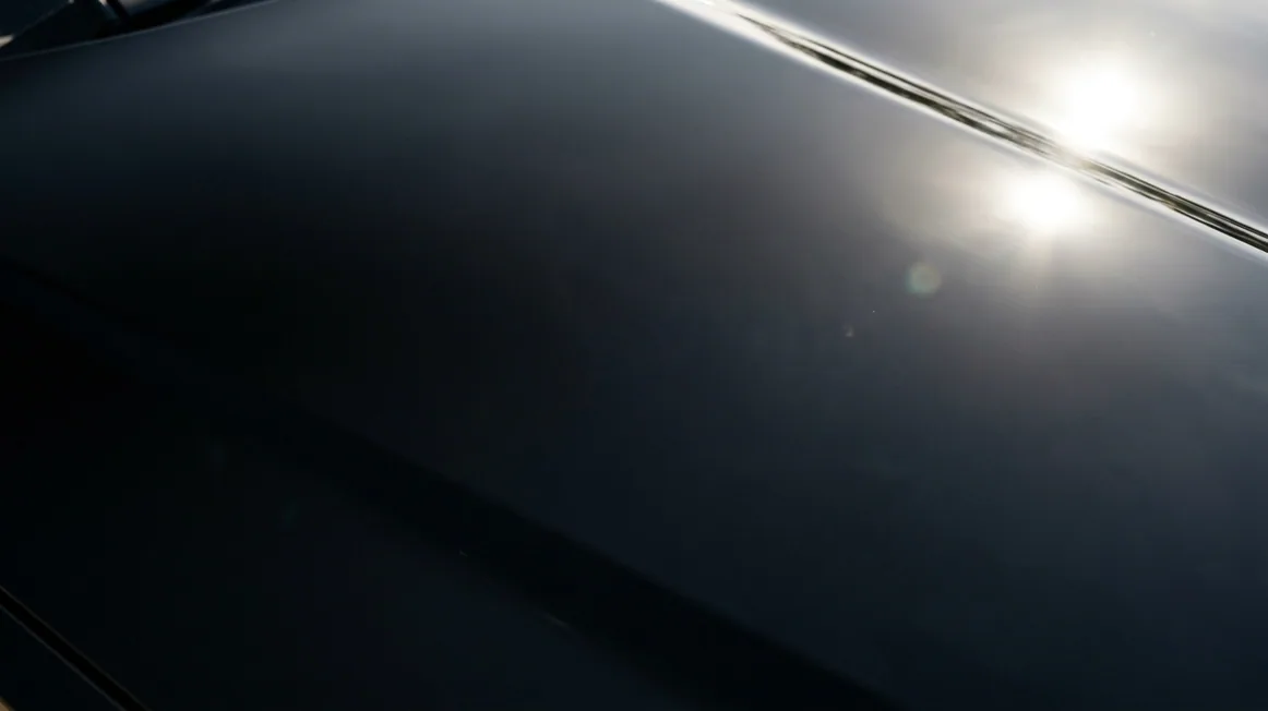 The same bonnet after correction, deep and clear in the same light
